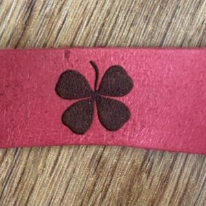 Chic Pink Leather Bracelet with Clover Motif